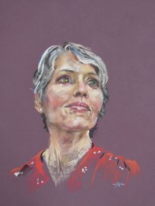 pastel portret van een vrouw in rode jurk, maat 40x30 cm op paars pastel papier Photocredit: Suzan Colon
